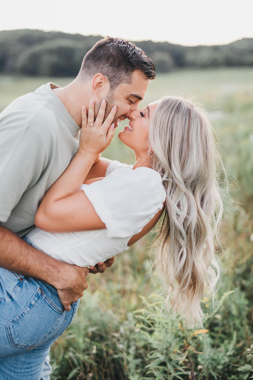 Philadelphia engagement session photos in a field