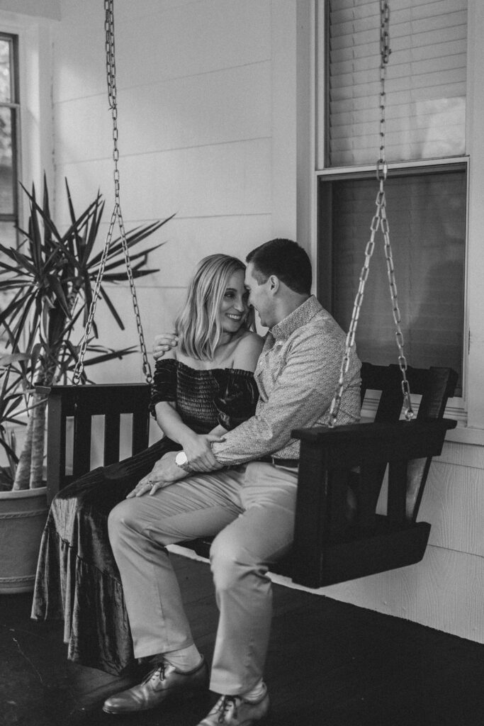 Black and white in home engagement session photo of couple in Collingswood NJ