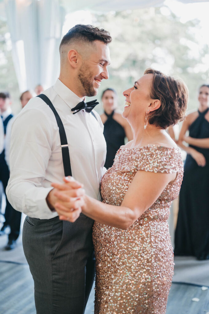 Groom and his mother dance during wedding reception at the Greystone Hall venue