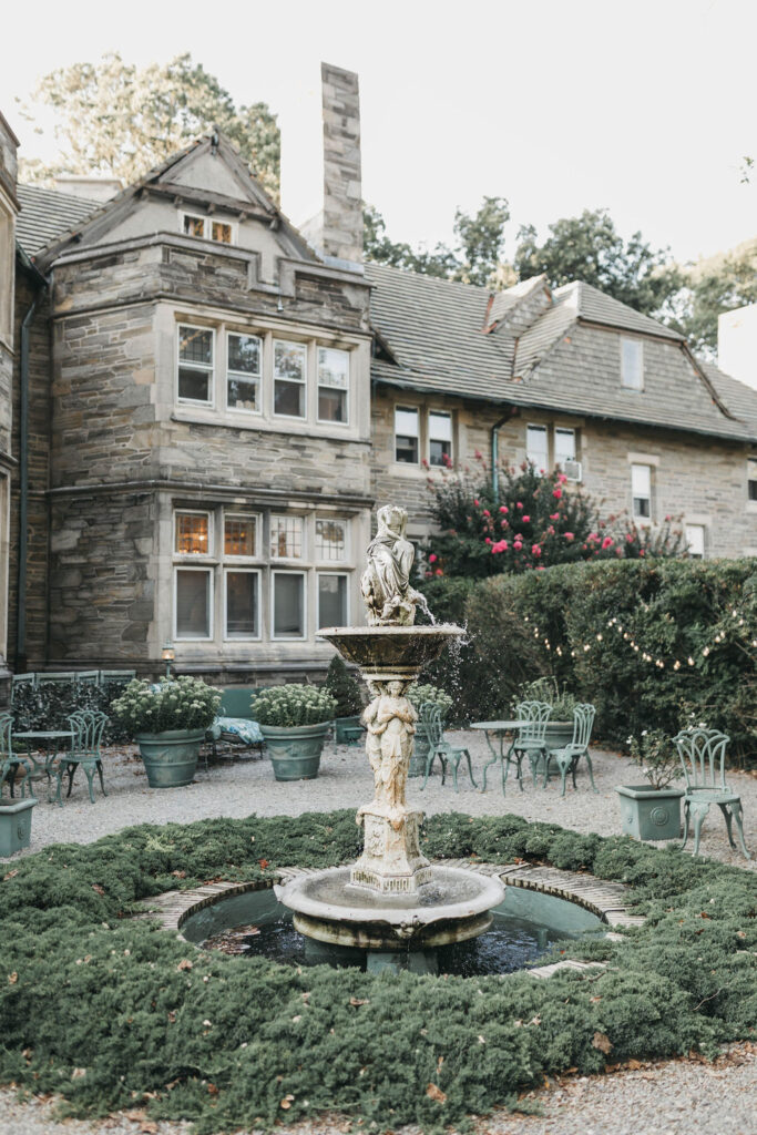 Stone fountain in the garden at historic Greystone Hall wedding venue in West Chester PA | Lauren E. Bliss Photography