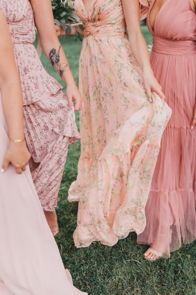 Mix and match pink floral bridesmaid gowns