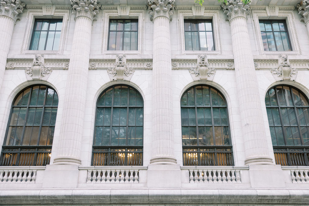 Exterior of the New York Public Library arched windows | Lauren Bliss Photography