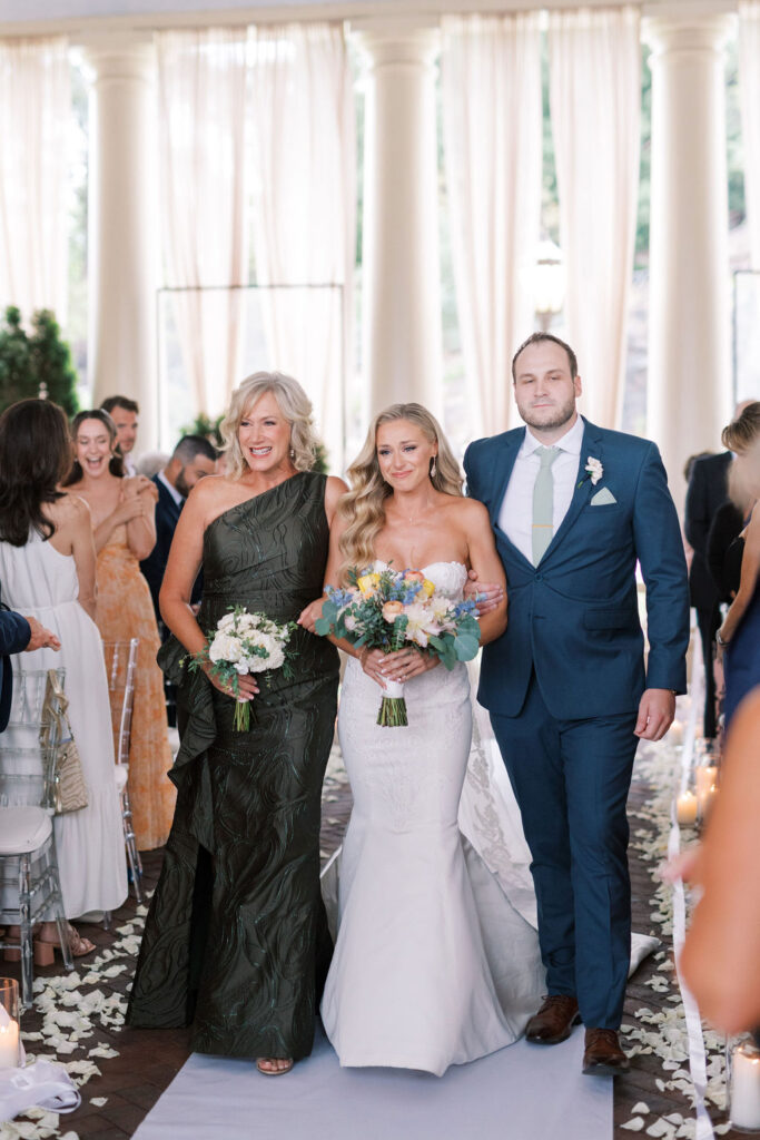 Bride walks down the aisle with mother and brother | Philadelphia Wedding at Waterworks Cescaphe by Lauren Bliss Photography