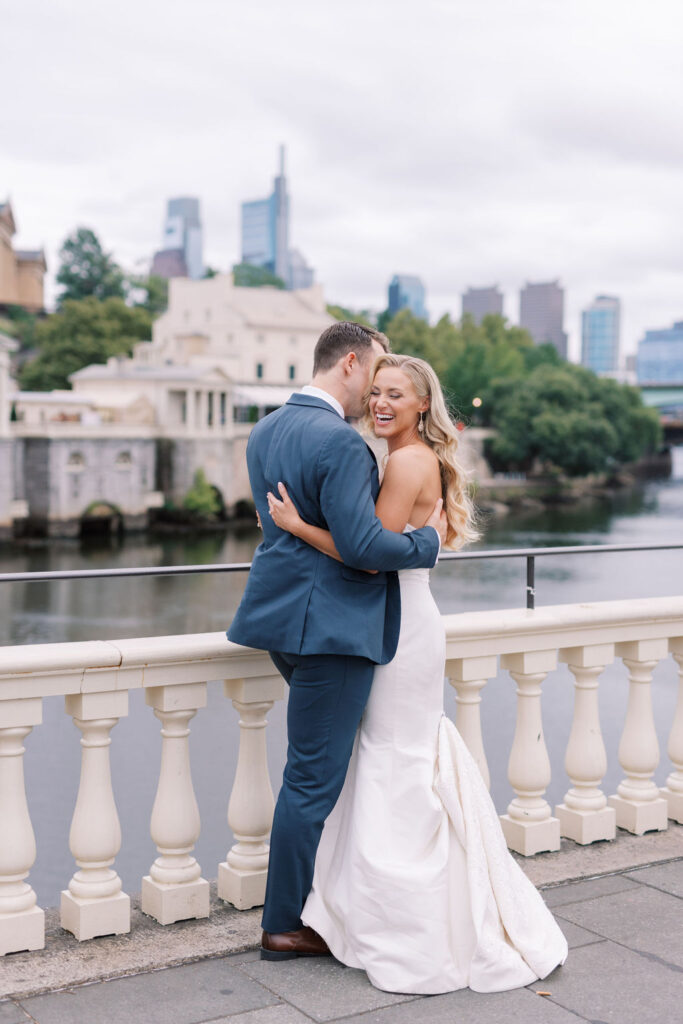 Bride and groom look out over the river at Waterworks Philly wedding venue | Philadelphia Wedding at Waterworks Cescaphe by Lauren Bliss Photography