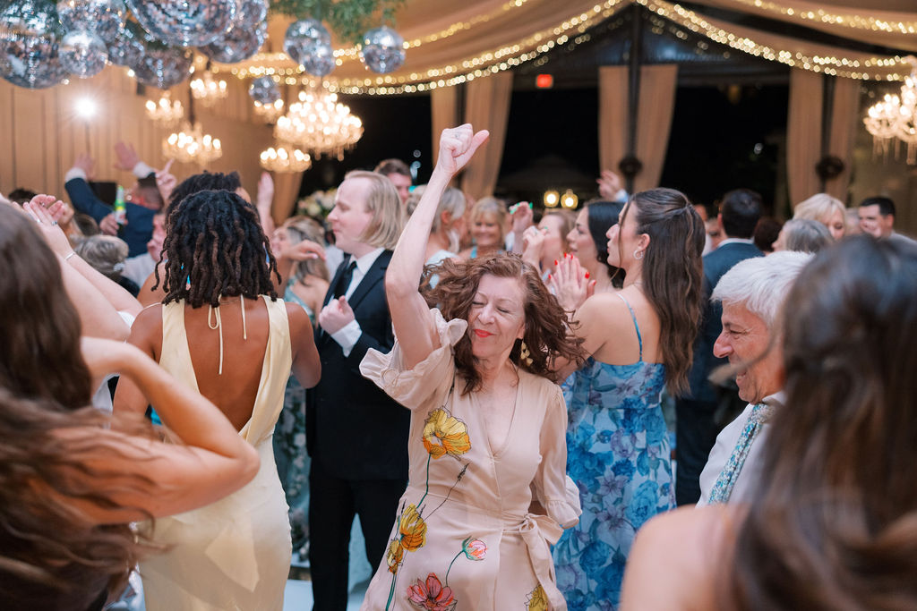 Guests dance on dance floor at wedding | Philadelphia Wedding at Waterworks Cescaphe by Lauren Bliss Photography