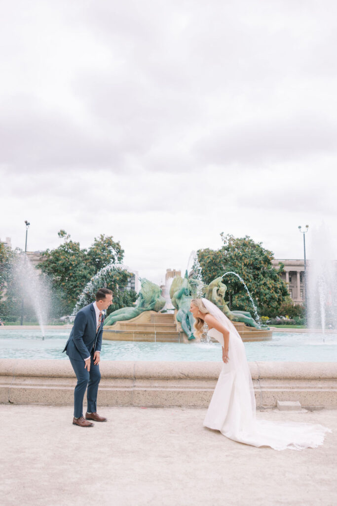 Bride and groom have first look in front of the Logan Fountain | Philadelphia Wedding at Waterworks Cescaphe by Lauren Bliss Photography