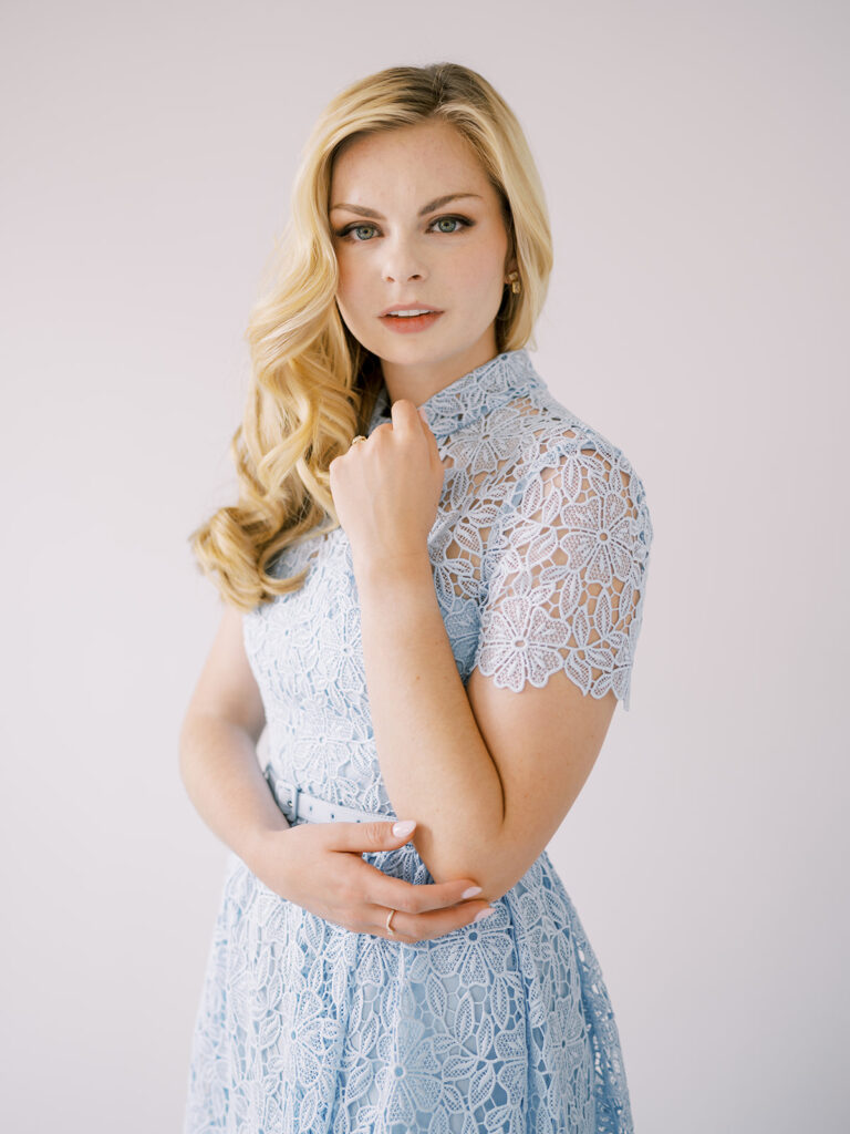 Elegant branding portrait of Lauren from the Lauren Bliss Photography associate team, captured in a white studio by Sophie Kaye Photography in NYC