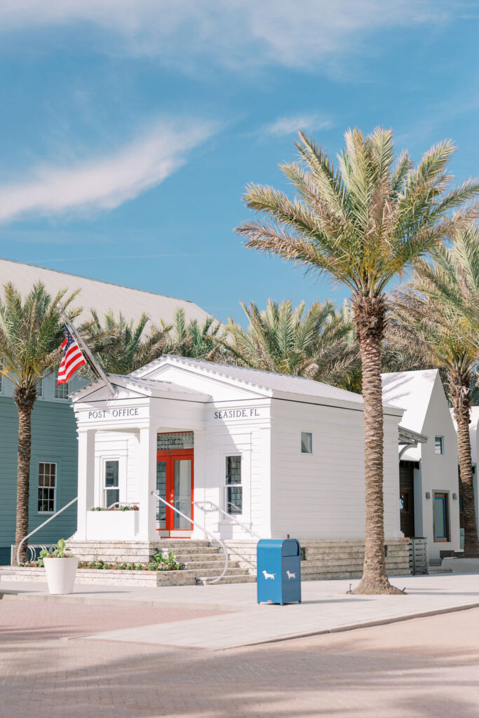 Seaside, Florida post office surrounded by palm trees—an iconic 30A landmark perfect for engagement sessions and destination photoshoots.