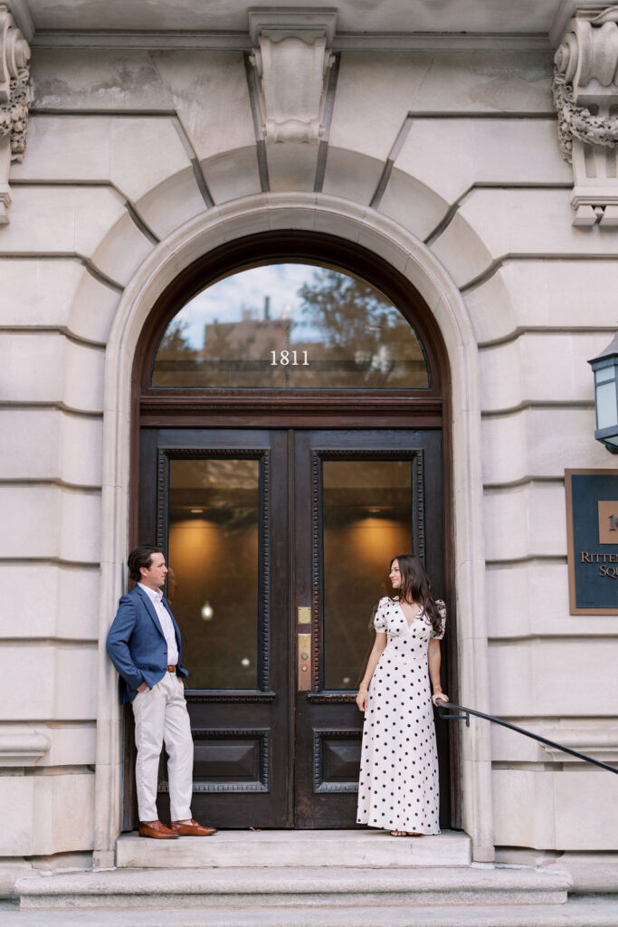 Engaged couple at 1811 Walnut St Philadelphia engagement photos