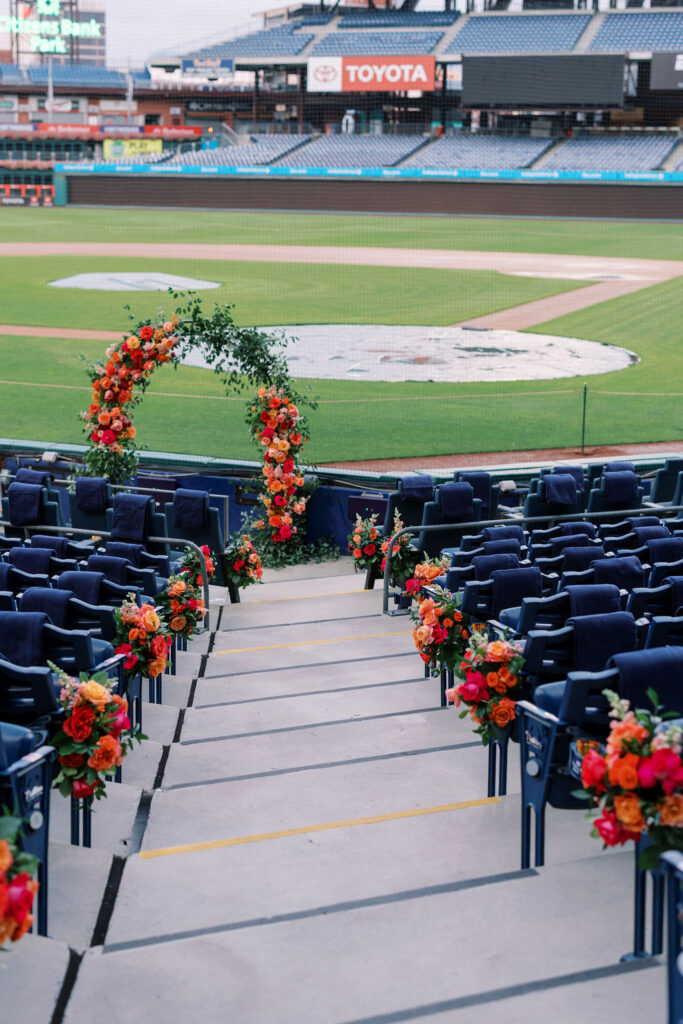 Baseball field wedding ceremony setup behind home plate at a Citizens Bank Park wedding